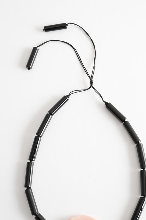 Black Agate Tubes with Large Hand Carved Conch Shell Medallion Necklace