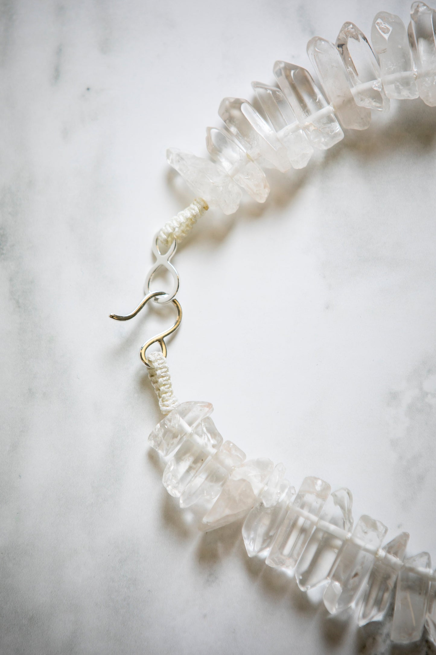 Big Tooth Quartz with Hand Carved Conch Shell Medallion