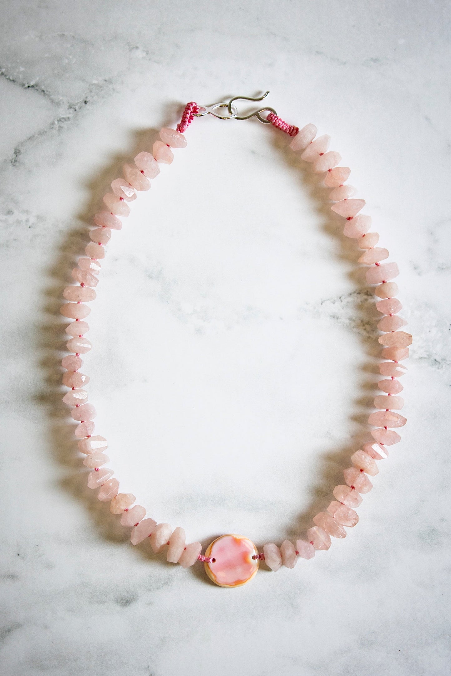 Faceted Pink Morganite with Hand Carved Conch Shell Coin
