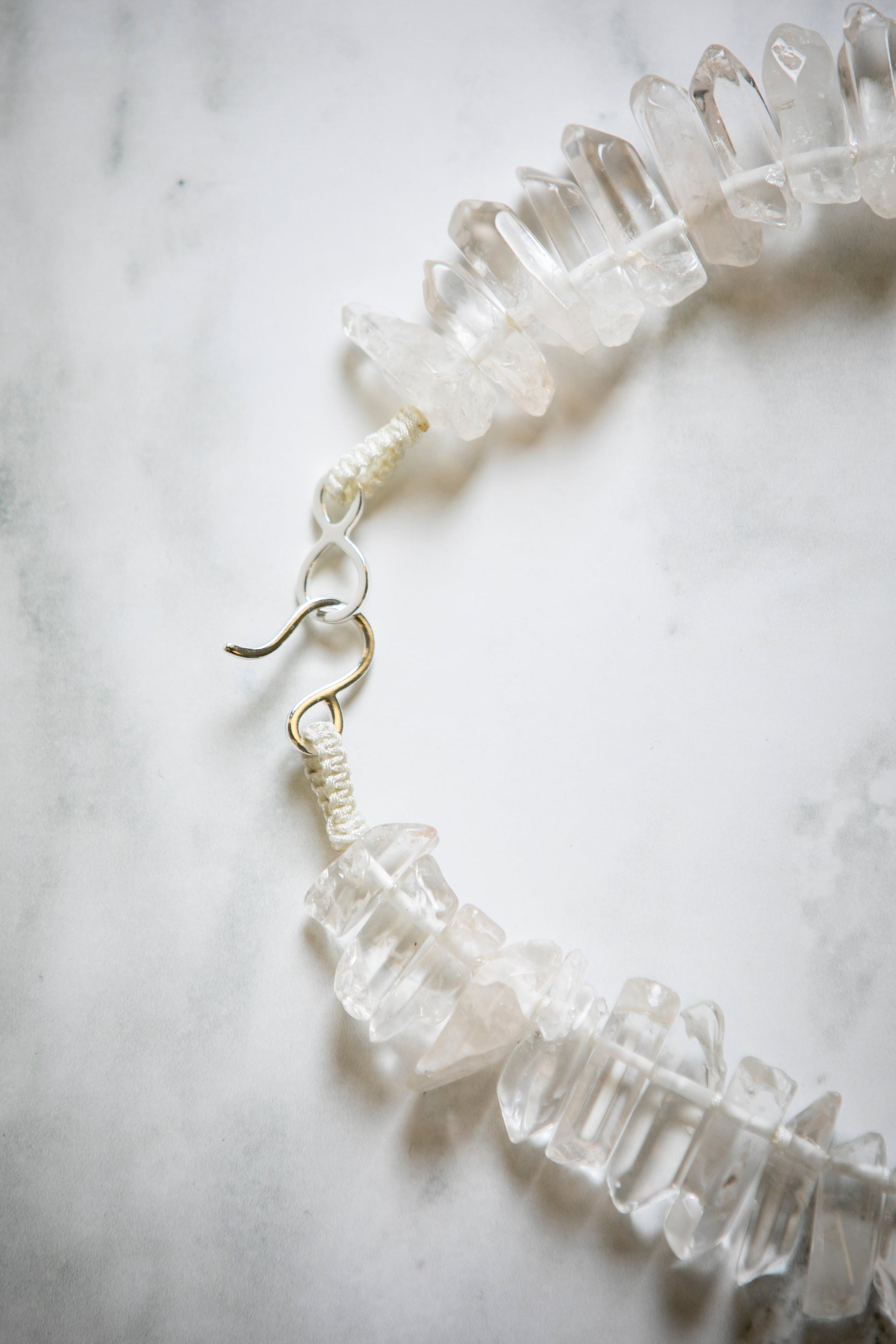 Big Tooth Quartz with Hand Carved Conch Shell Medallion